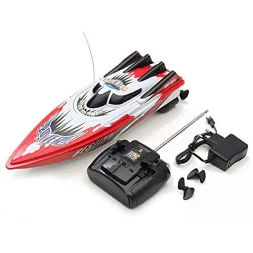Red and white RC speedboat next to its transmitter