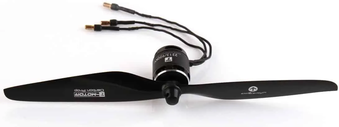 Black two-blade drone propeller mounted on a brushless motor with its three wires