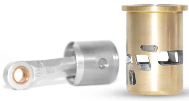 Piston with connecting rod and brass cylinder sleeve from a nitro RC car engine