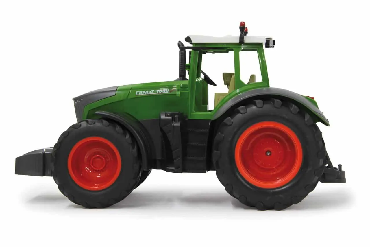 Green Fendt 1050 RC tractor with red wheels, side view