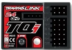 Traxxas TQi 2.4 GHz receiver with its channel ports and link button