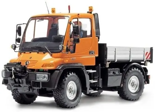 Orange Mercedes-Benz Unimog-style RC truck with a dropside cargo bed