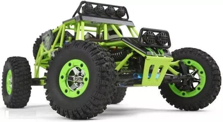 Green WLtoys 12428 RC crawler with a tube-frame body, roof light bar and large knobby tires